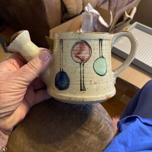 Speckled Cream Ceramic Watering-Can Mug with Blue, Red and Aqua Ornaments